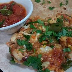 A picture of Egg bhujiya wid simple roti.
