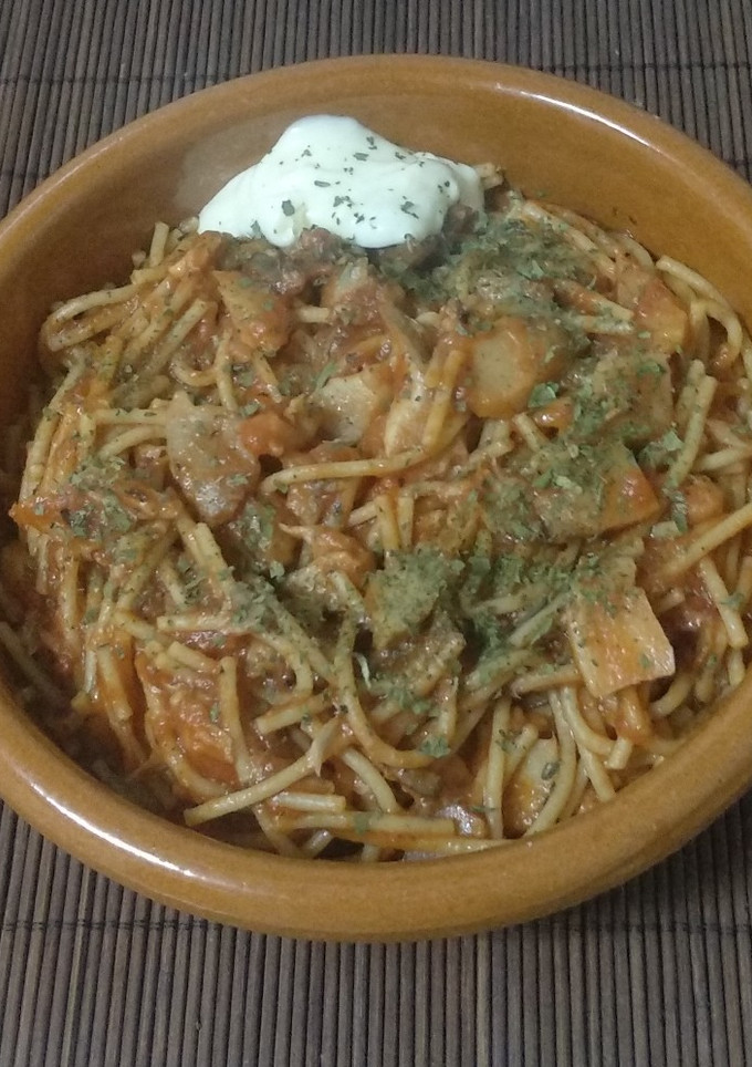 Una foto de Fideos con tomate y setas