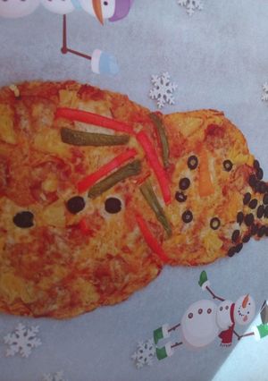 Una foto de Pizza muñeco de nieve