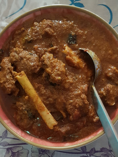 A picture of Mutton varutha curry.