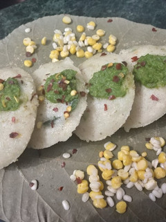 A picture of Rava idli with dahiya pudina chutney.