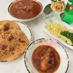 A picture of Chicken nihaari with homemade whole wheat naan !.
