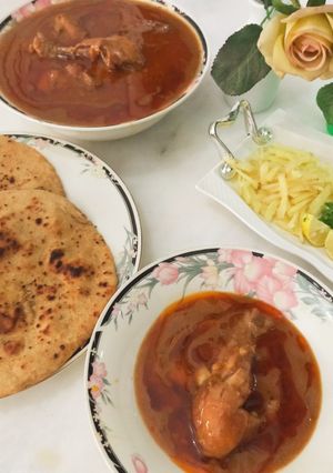 A picture of Chicken nihaari with homemade whole wheat naan !.