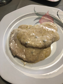 Una foto de Lomo con salsa a la pimienta