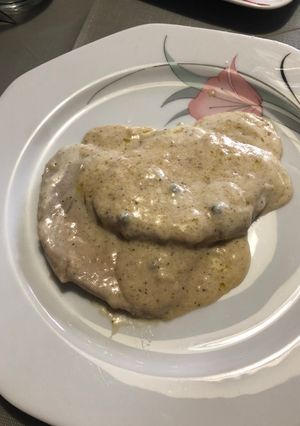 Una foto de Lomo con salsa a la pimienta