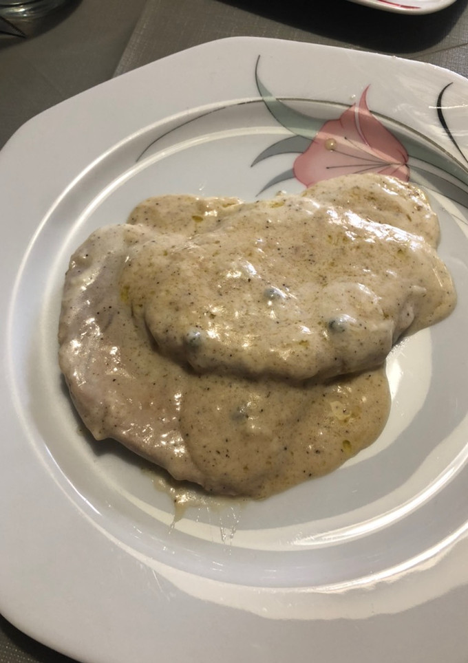 Una foto de Lomo con salsa a la pimienta