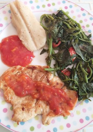A picture of Grilled Chicken Breast... Steamed Herbs and Tamalitos.