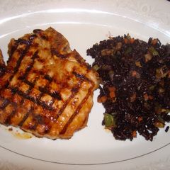 Grilled szechuan pork chops with black rice A picture of Grilled szechuan pork chops with black rice.