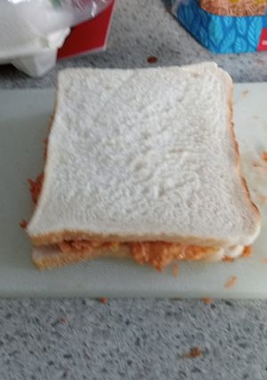 A picture of Carrot and chicken sandwich.