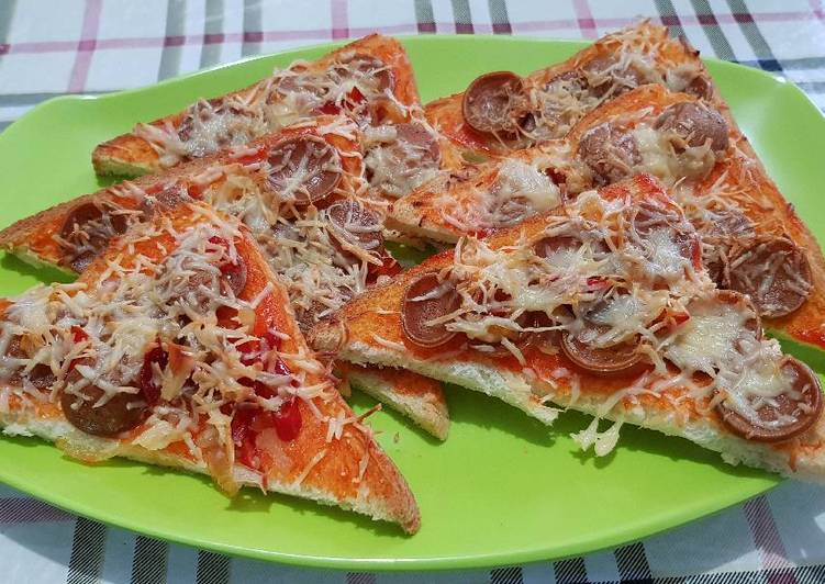 Resep Pizza Roti Tawar Sosis Panggang Oleh En Chie Cookpad