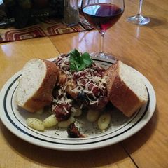 A picture of Italian Olive Chicken and Peppered Gnocchi.