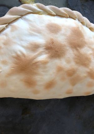 Una foto de Tarta de cebolla y queso