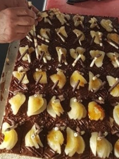 Una foto de Tartitas de chocolate y pera caramelizada