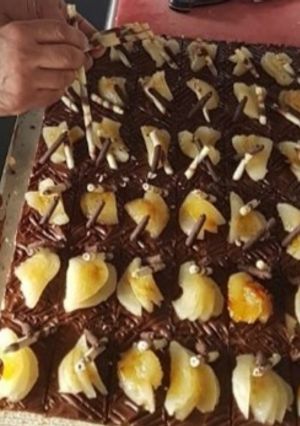 Una foto de Tartitas de chocolate y pera caramelizada