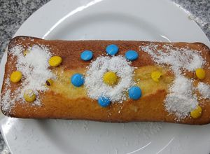 Una foto de Budín de naranja con confites de chocolate!! Súper rico y fácil