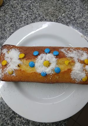 Una foto de Budín de naranja con confites de chocolate!! Súper rico y fácil