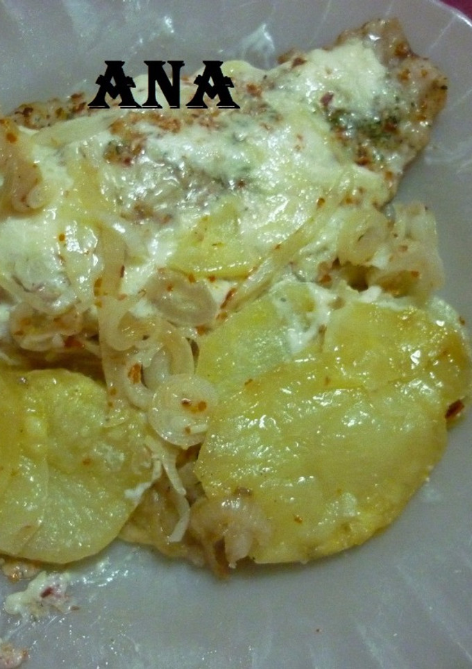 Una foto de Pescado con milhojas de papas en microondas 