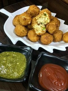 A picture of Cheesy paneer popcorns.