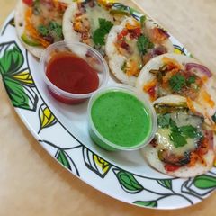 A picture of Cheesy Vegetable Uttappam.
