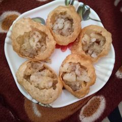A picture of Potato pani puri.