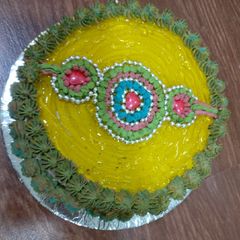 A picture of Eggless Rakhi Themed Cake.