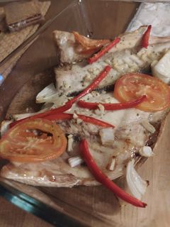 Una foto de 🐟 Dorada al horno con verduras