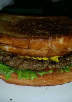 A picture of "The Heart Stopper" Burger.