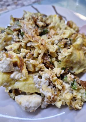 A picture of Strapatsada with Zucchini and Feta.