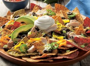 Una foto de Nachos con Pollo