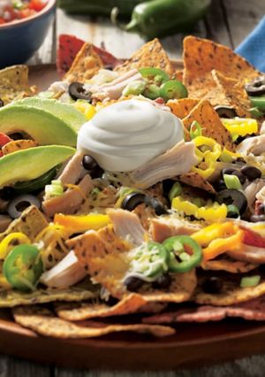 Una foto de Nachos con Pollo