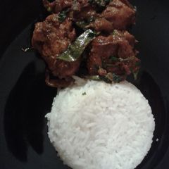A picture of Chicken tomato roast.