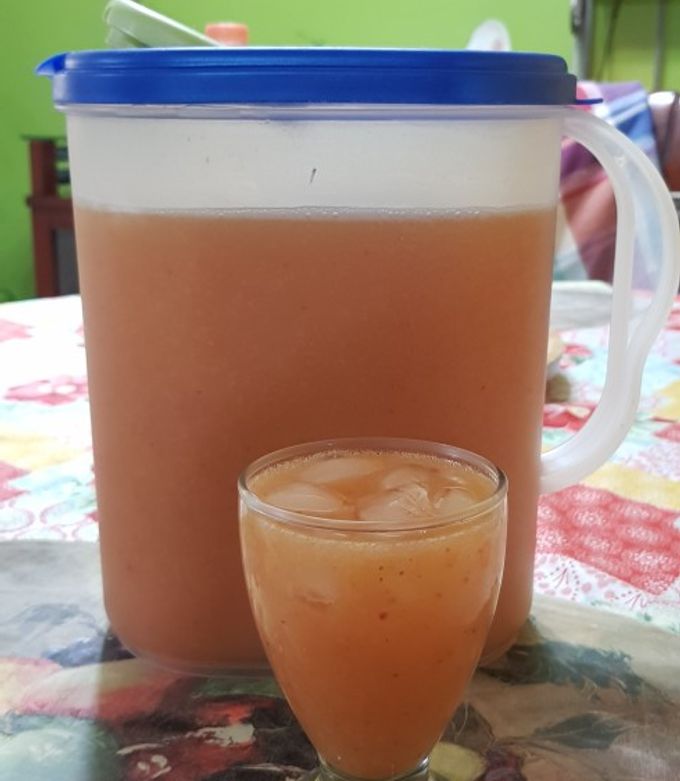 Una foto de Agua de Mango con Fresa