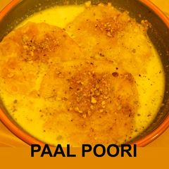 A picture of Paal Poori (Poori soaked in milk).