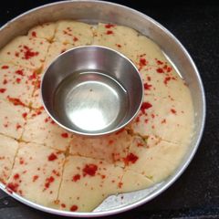 Gujarati famous dhokla with garlic red chutney A picture of Gujarati famous dhokla with garlic red chutney.