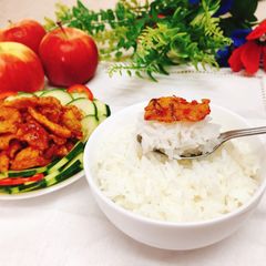 A picture of Crispy chicken skin with spicy sauce.