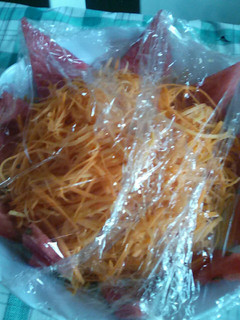A picture of Carrot salad with watermelon.