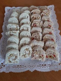 Una foto de Arrollados de pan de miga