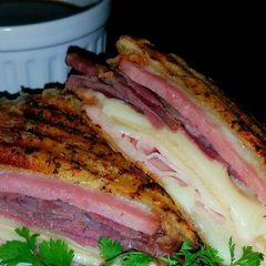 A picture of Mike's Hot 3 Meat 2 Cheese French Dip Paninis.