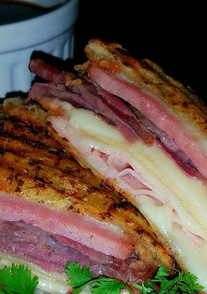 A picture of Mike's Hot 3 Meat 2 Cheese French Dip Paninis.