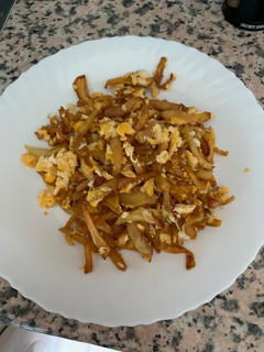 Una foto de Patatas con huevo revuelto