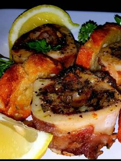A picture of Mike's Roasted Bone Marrow & Crustiini Appetizers.