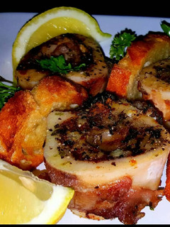 A picture of Mike's Roasted Bone Marrow & Crustiini Appetizers.