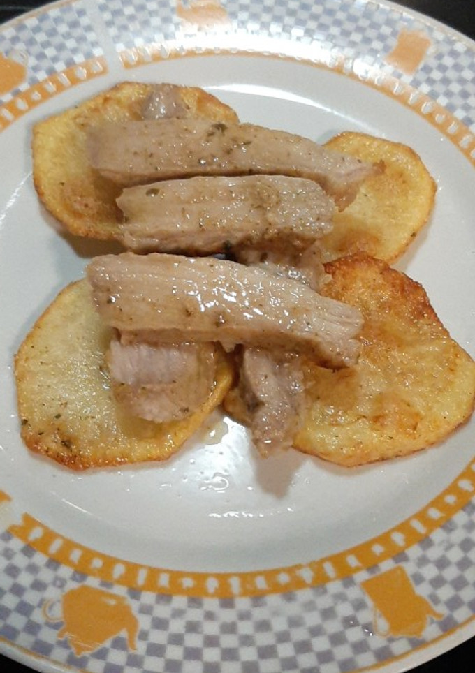 Una foto de Cruceta de cerdo al curry con lima