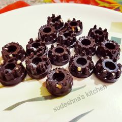 A picture of Rosted Almond Dark Chocolates.
