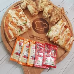 Domino,s style tandoori hot pizza A picture of Domino,s style tandoori hot pizza.