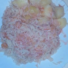 A picture of Fried rice and potatoes.