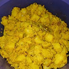 Aaloo posto (Potatoes and poppy seeds paste) A picture of Aaloo posto (Potatoes and poppy seeds paste).