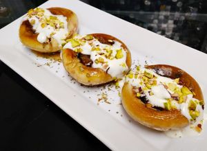 Foto principal de Champis rellenos de membrillo con salsa de queso Idiazabal