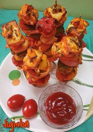 A picture of Grilled paneer and vegetable tikka.