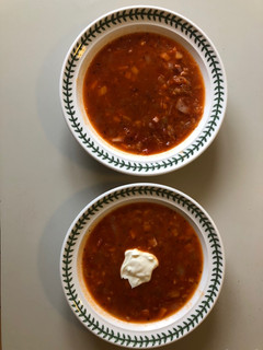 A picture of Tinned Tomato, Red Onion & Red Lentil soup (with ham stock & bits or vegetarian alternative).